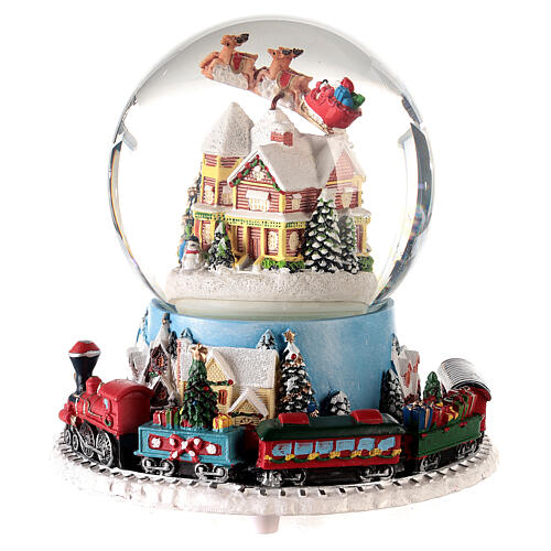 Caixa de música globo de neve comboio, casa e Pai Natal no trenó, 16x16x16 cm