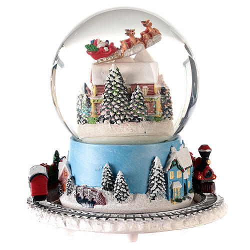 Caixa de música globo de neve comboio, casa e Pai Natal no trenó, 16x16x16 cm